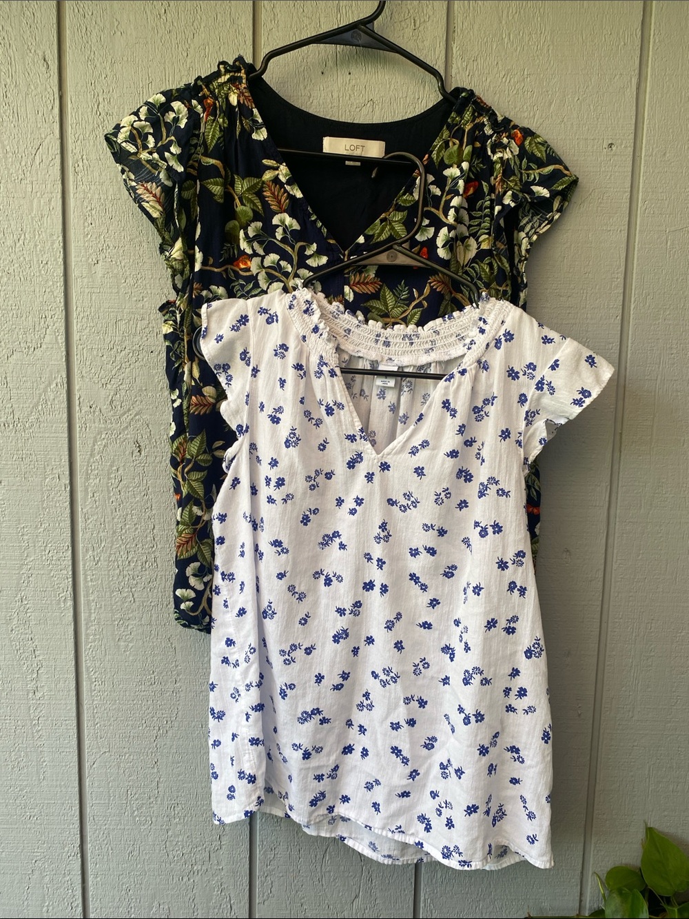 Two V-Neck Short Sleeve Tops with Floral Print. LOFT and Old Navy